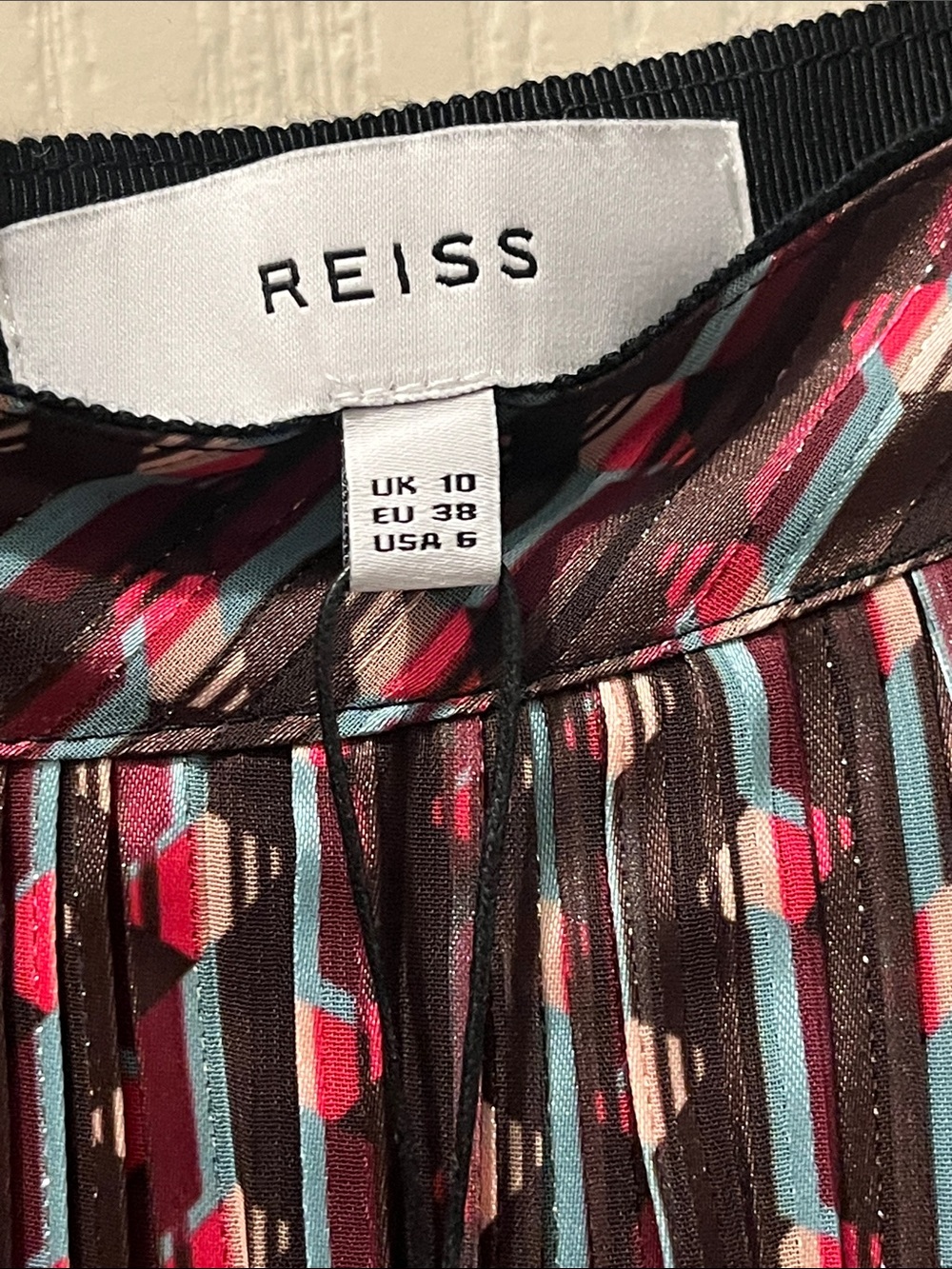 Reiss Brown Pleated Midi Skirt with Red & Teal Geometric Print